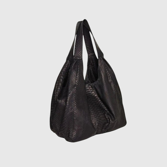 Sac hobo Leather craftman en cuir de python noir avec une texture à écailles unique et une silhouette souple