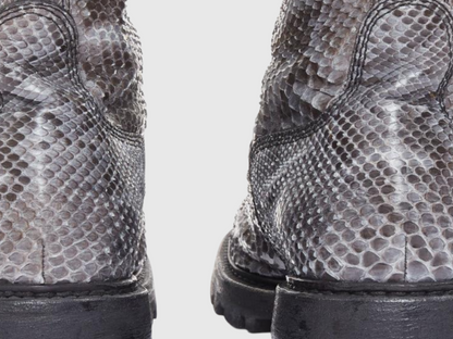 Close-up of genuine python leather boot toe