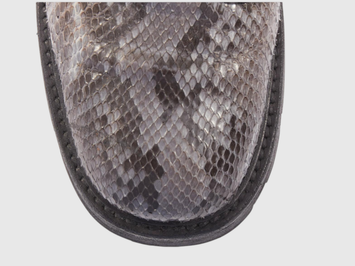 Close-up of python leather boot shaft and laces