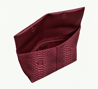 Deep Burgundy genuine python leather clutch open showing burgundy lining, magnetic flap and zip pocket