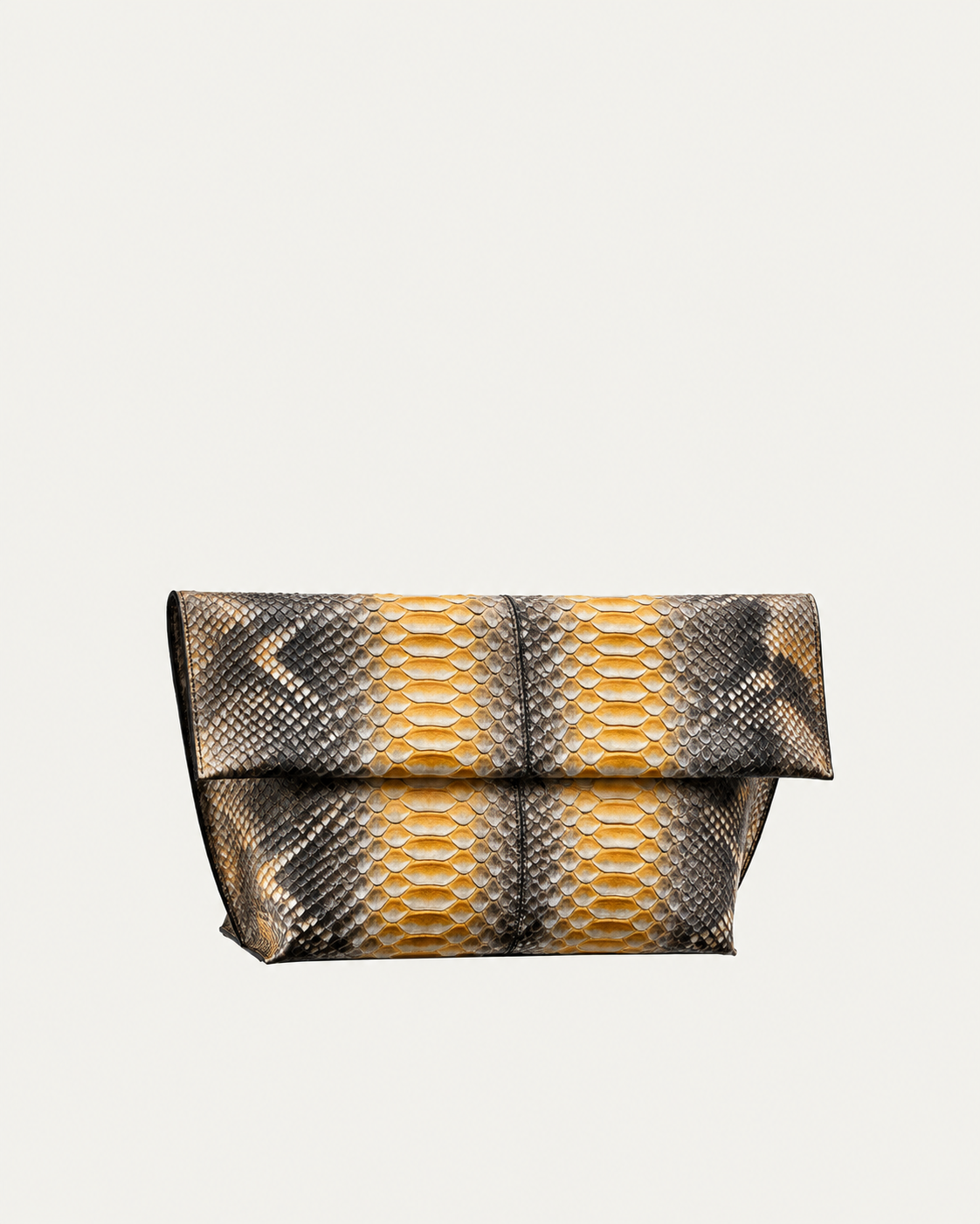 Honey Gold and charcoal python leather foldover clutch, three-quarter studio view