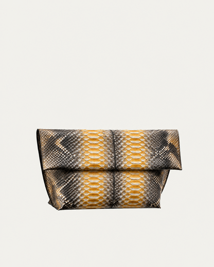Honey Gold and charcoal python leather foldover clutch, three-quarter studio view