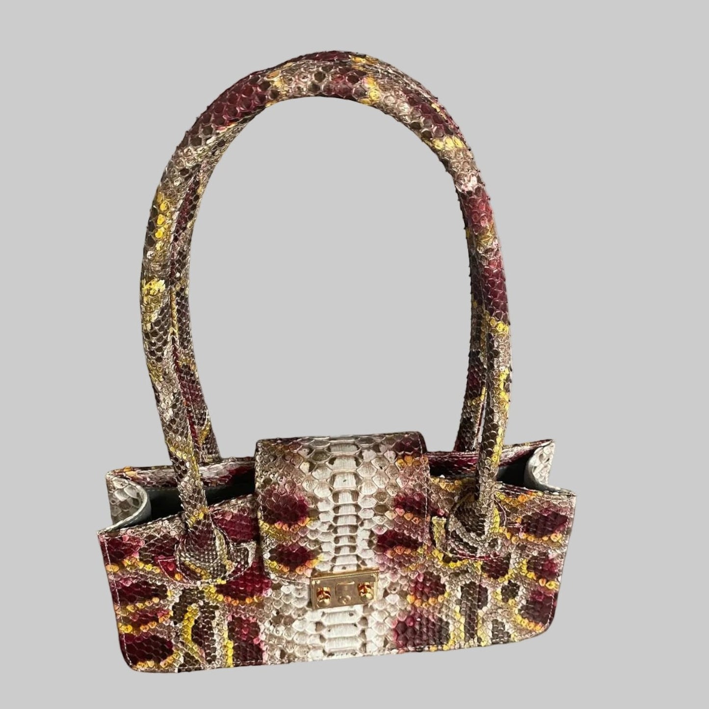 Sac à main Leather craftman Serpentina Rubis en cuir de python véritable multicolore avec fermoir doré