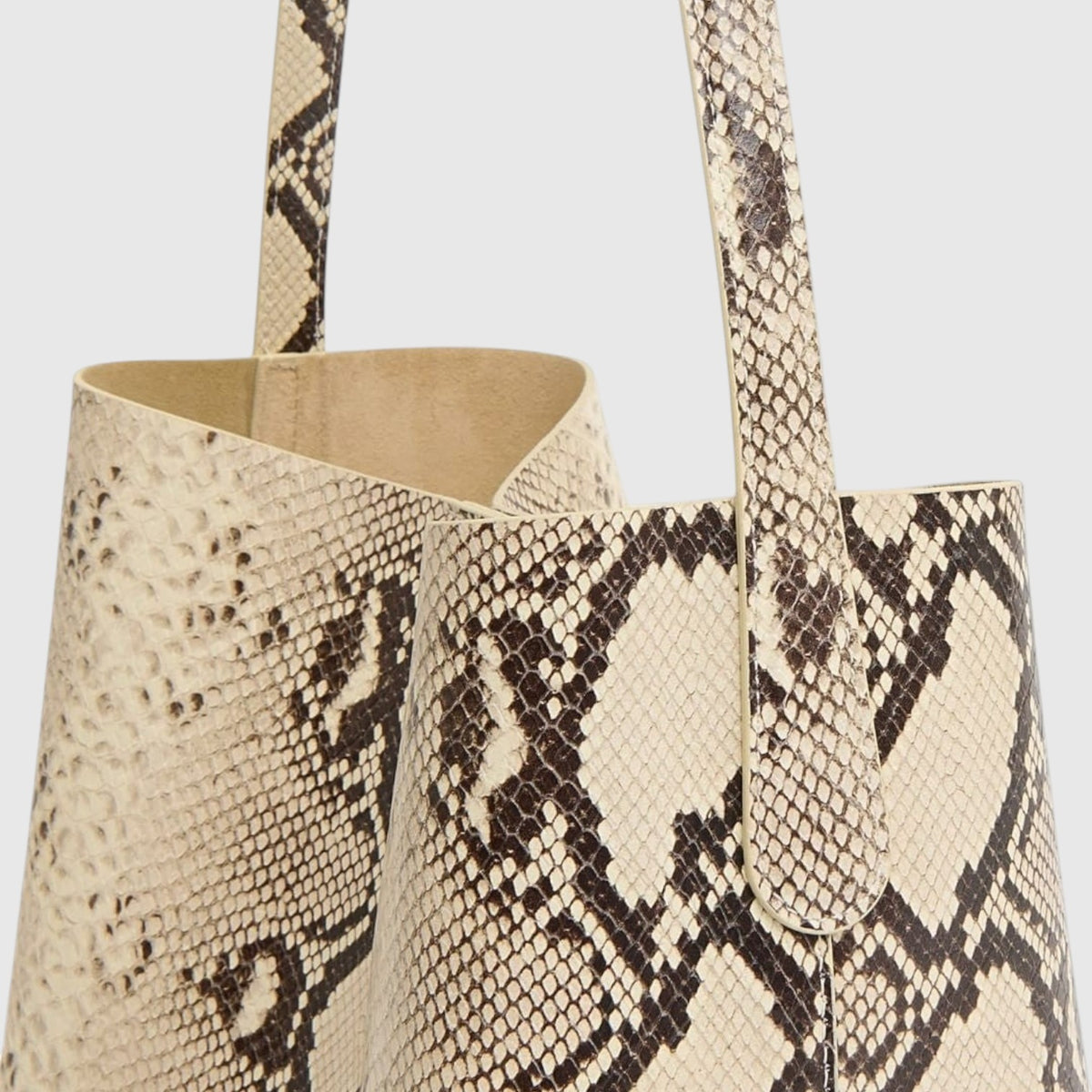 Sac cabas Savannah Python de Leather craftman en cuir de python véritable beige et marron à la texture organique.