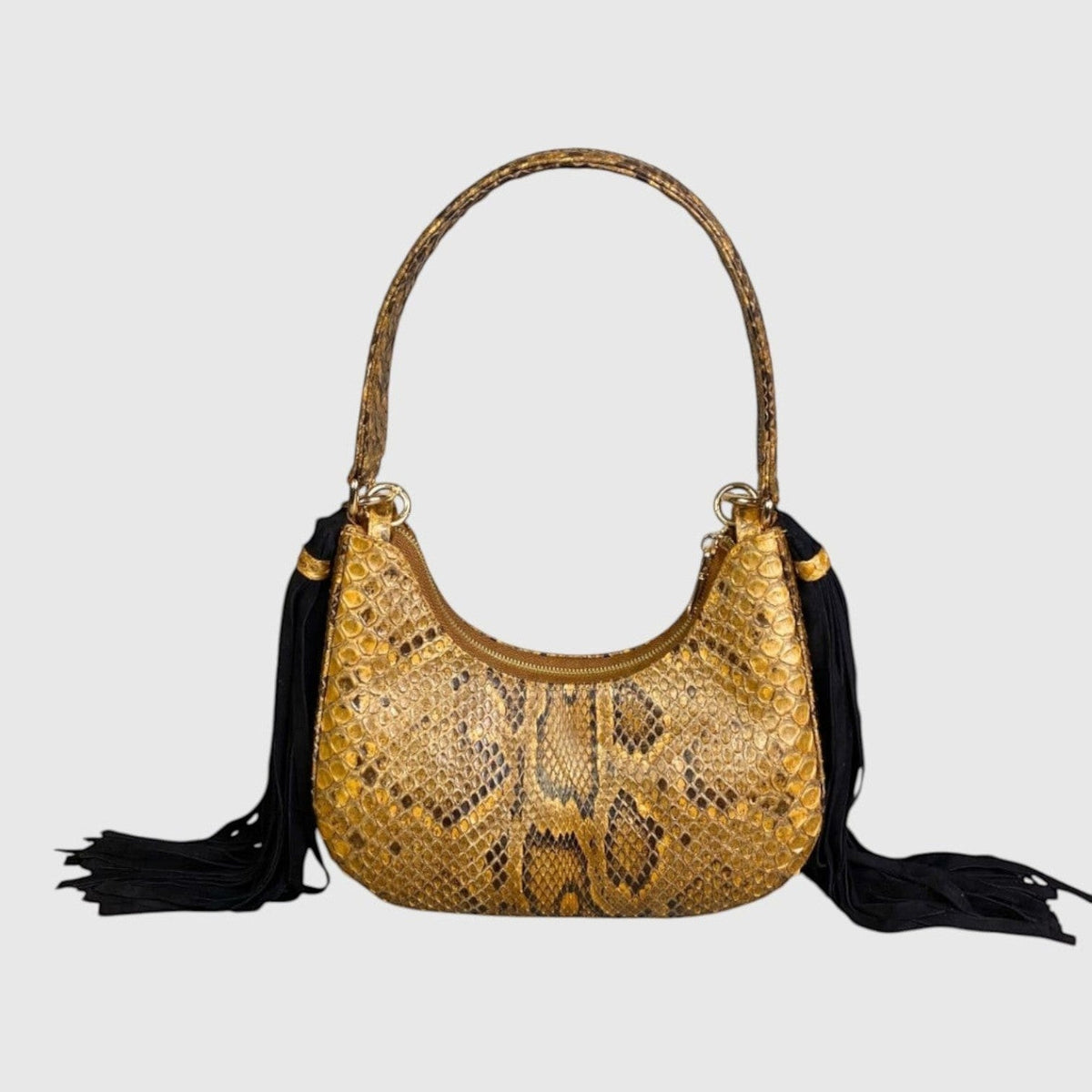 Sac à main Leather craftman Fofana Sahara en cuir de serpent doré avec franges noires latérales