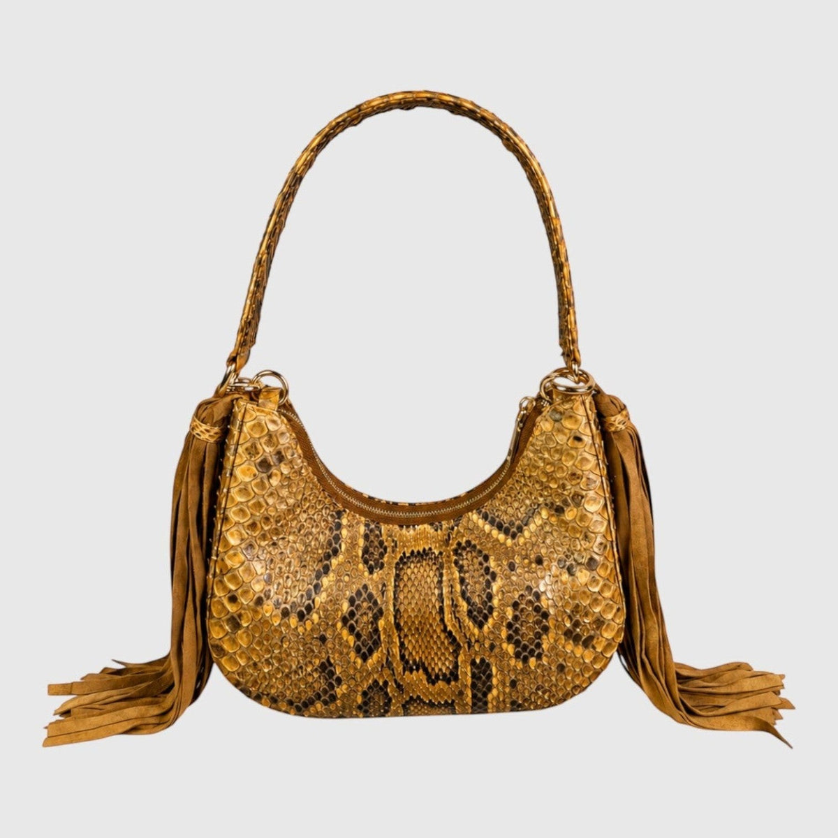 Sac à main Leather craftman Fofana Sahara en cuir de serpent marron avec franges latérales et anse tressée