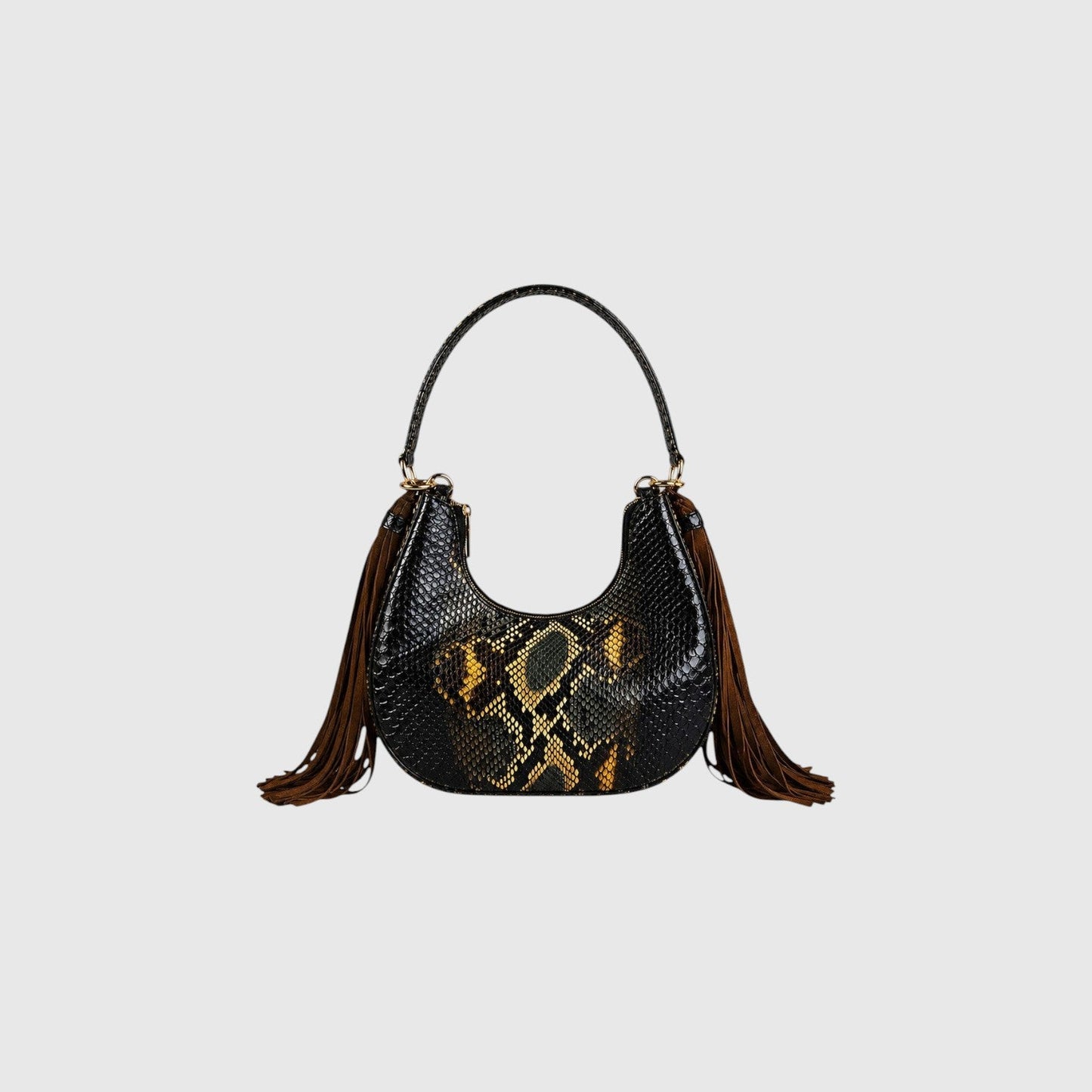 Sac hobo Fofana Leather craftman en cuir de python noir et jaune avec pompons en daim et détails dorés.