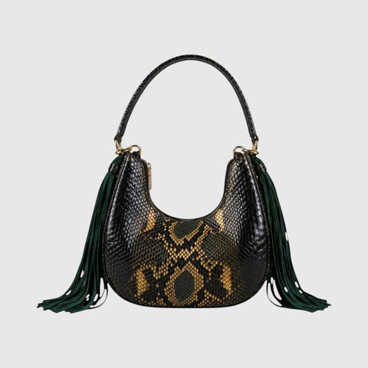 Sac hobo Leather craftman Fofana en cuir de python véritable avec pompons en daim vert et détails dorés.
