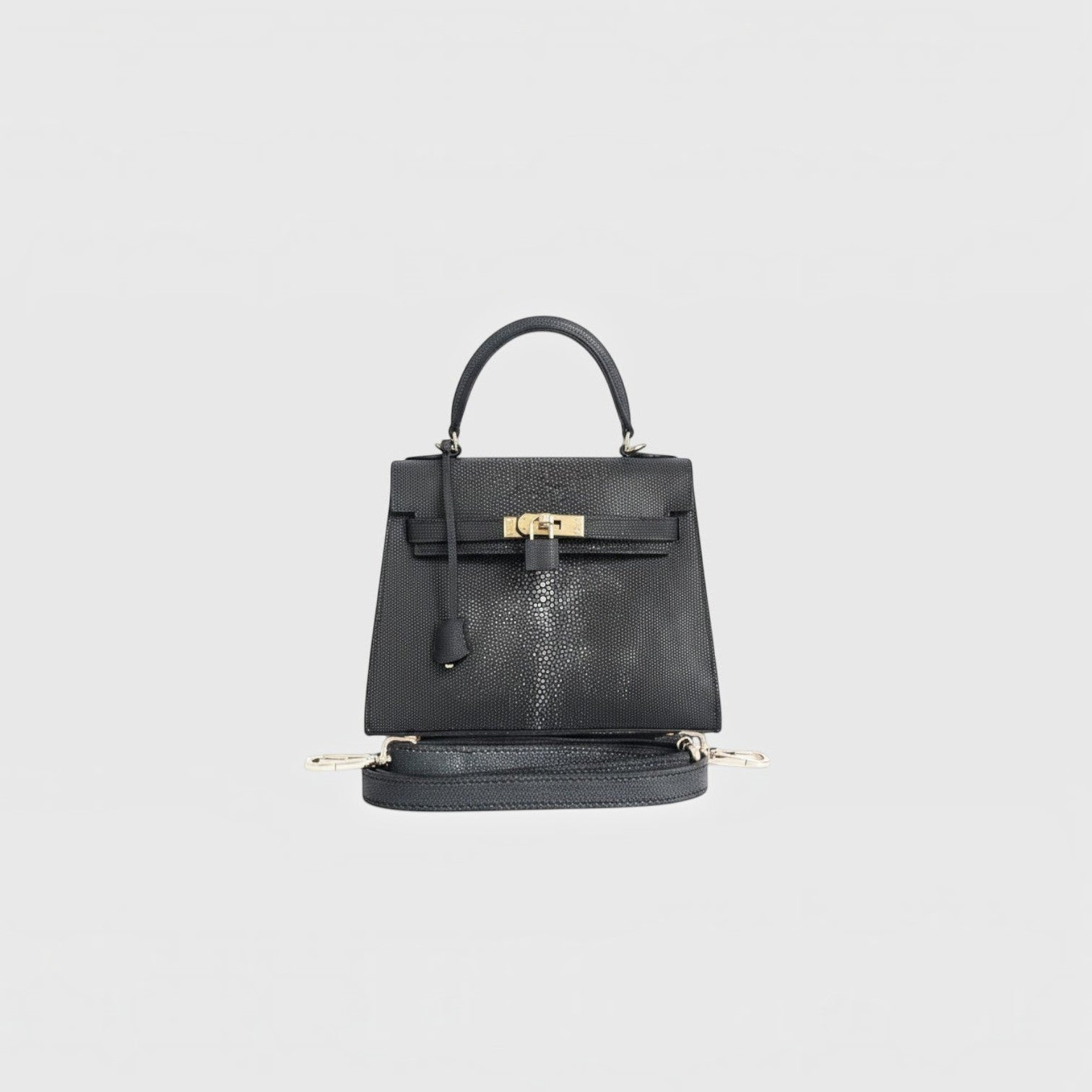 Sac à main structuré Leather craftman en cuir de galuchat noir avec fermoir métallique doré et anse élégante