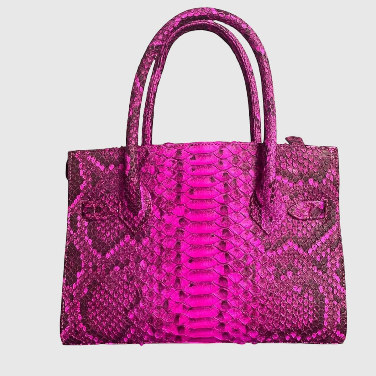 Sac à main Leather craftman en cuir de python fuchsia structuré avec poignées doubles et détails métalliques argentés