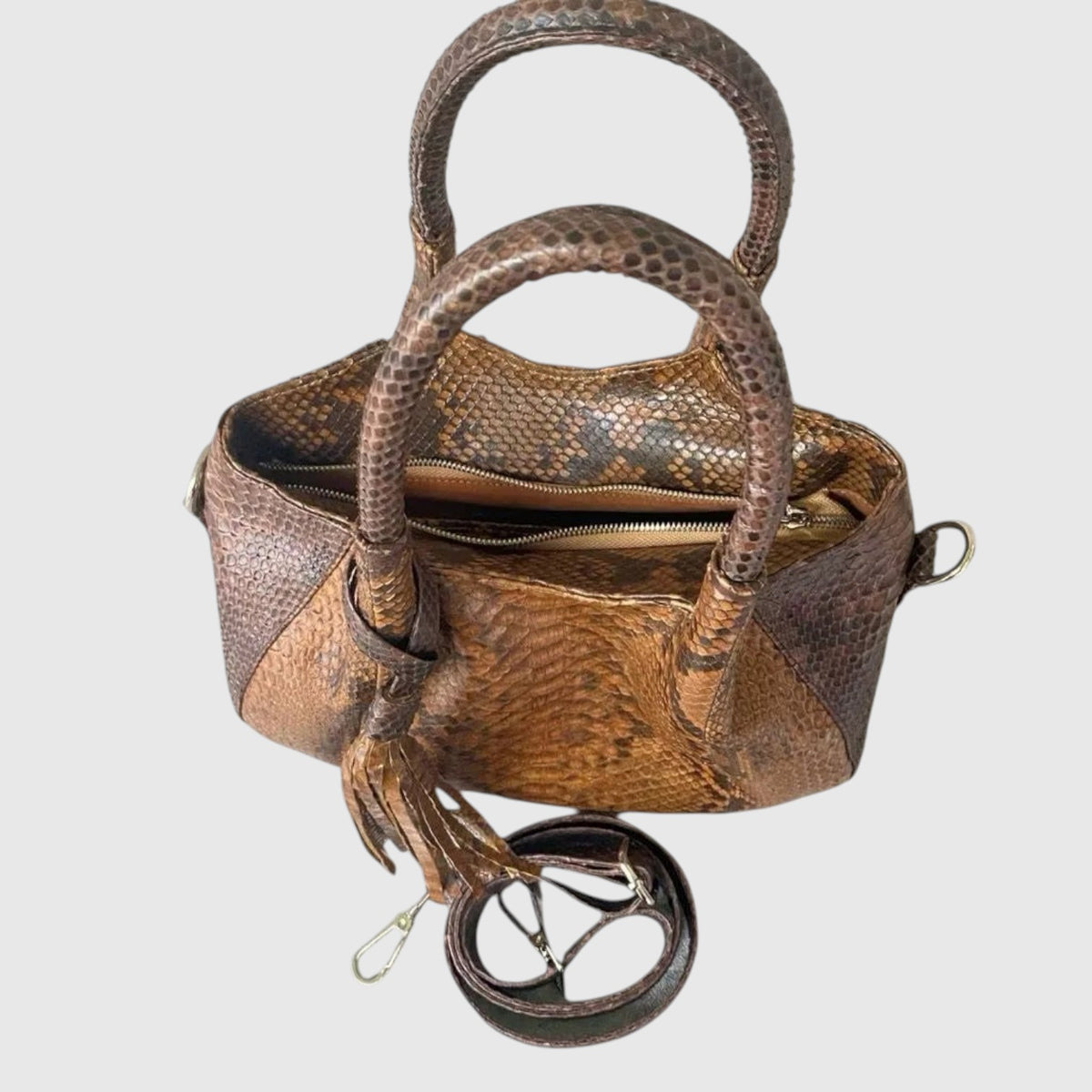 Sac à main Leather craftman en cuir de python véritable marron avec anses structurées et détail pompon élégant