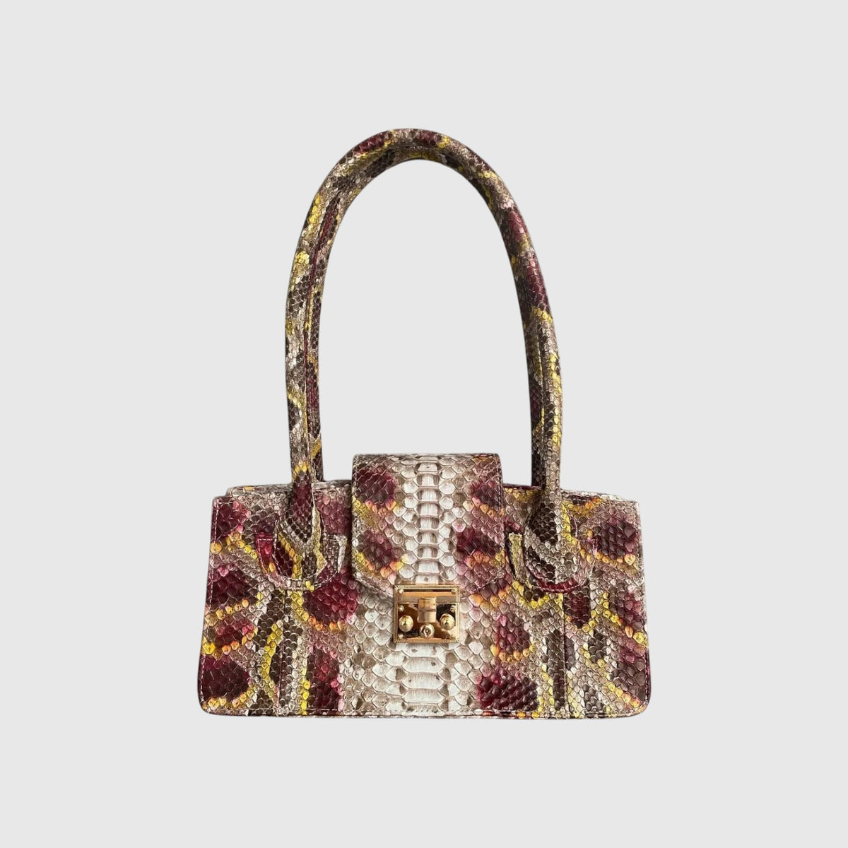 Sac à main Leather craftman Serpentina Rubis en cuir de python multicolore avec fermoir doré et anses structurées
