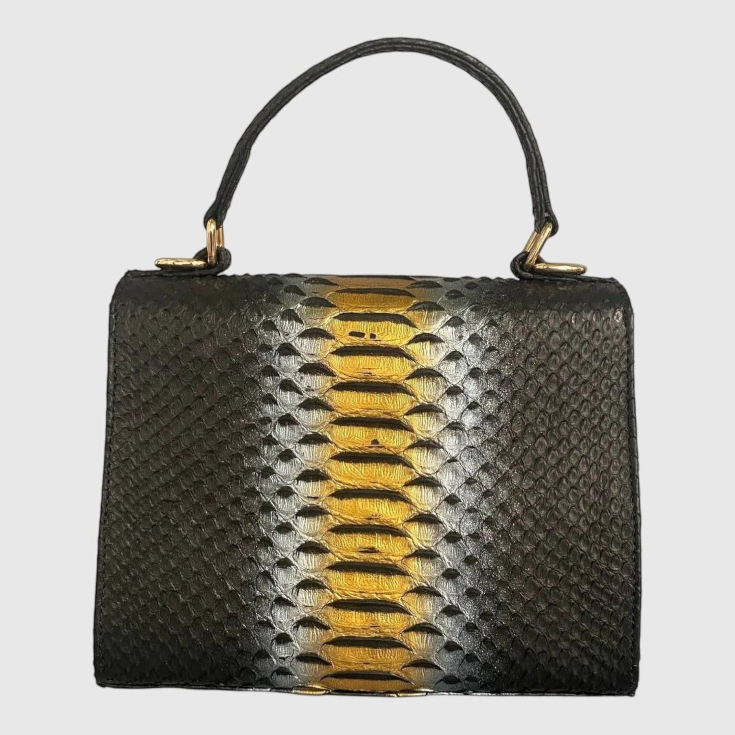 Sac à main structuré Leather craftman en cuir de python noir avec une bande centrale dorée et une poignée supérieure.