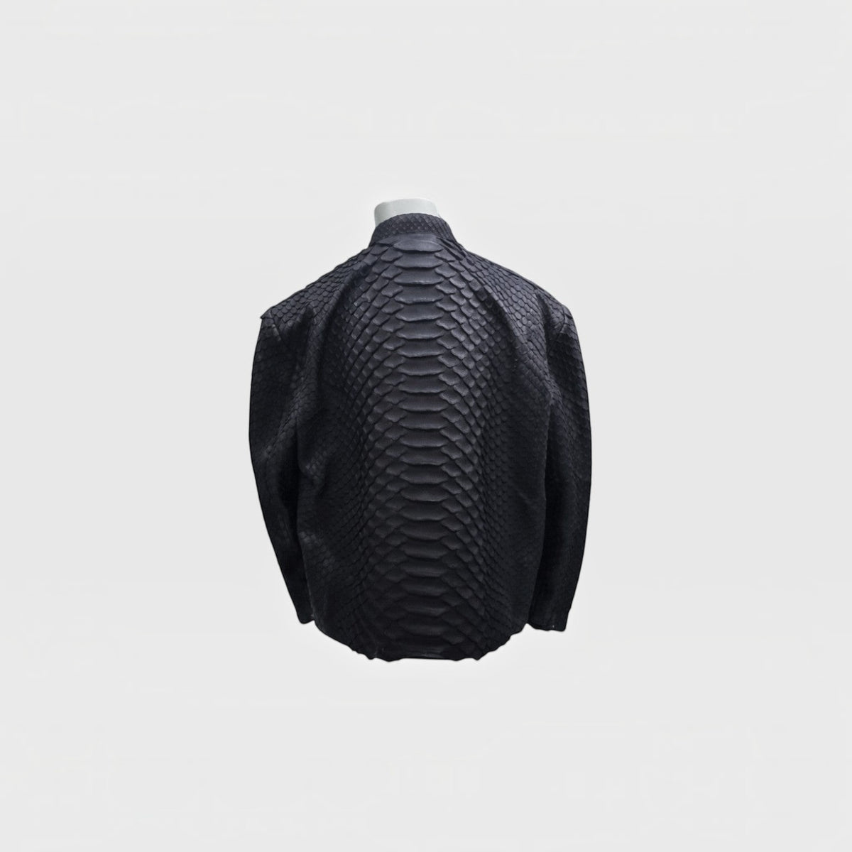 Veste Dragon Python Leather craftman en cuir de serpent noir avec texture d'écailles et design de colonne vertébrale