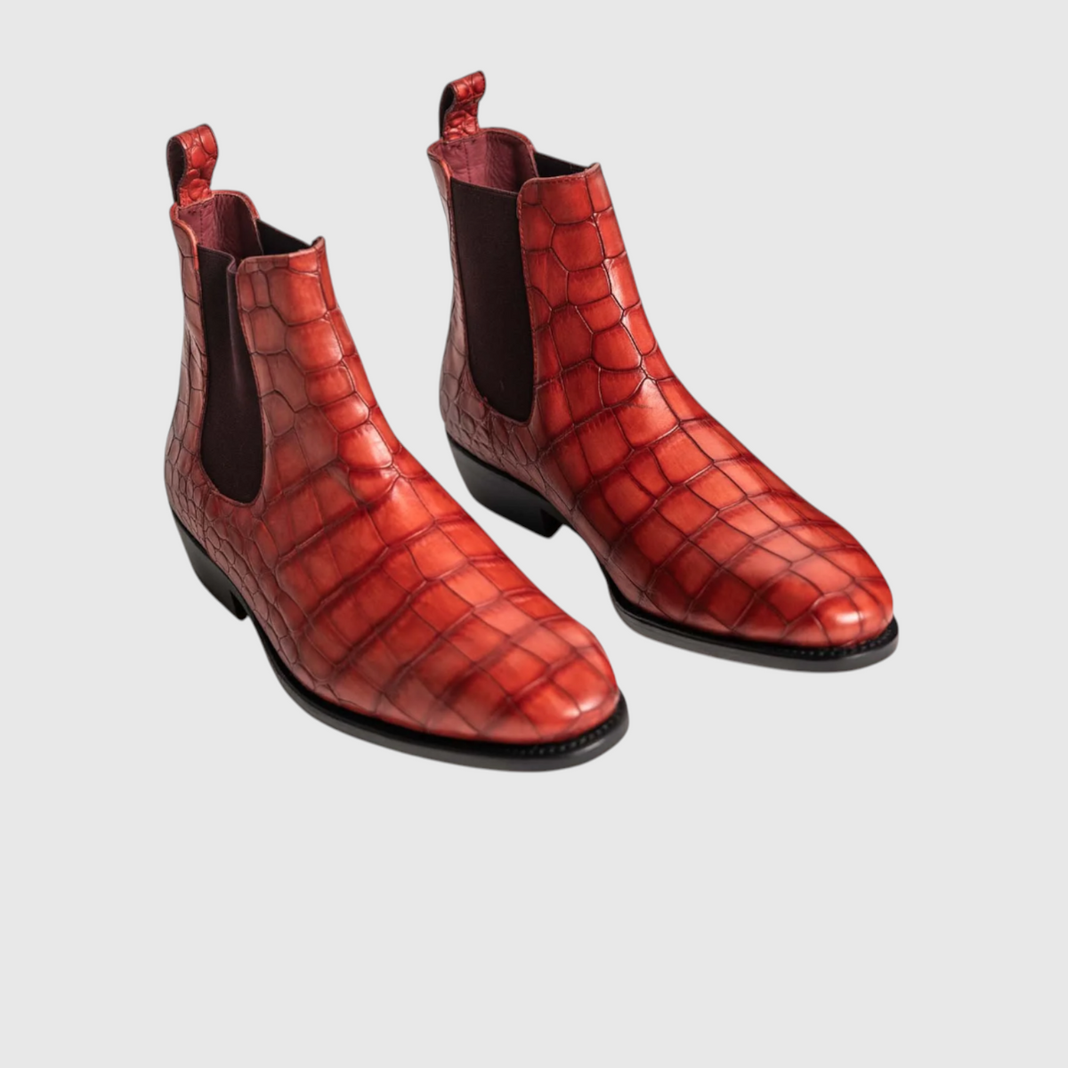 Men's crocodile leather Chelsea ankle boots side and front view in red