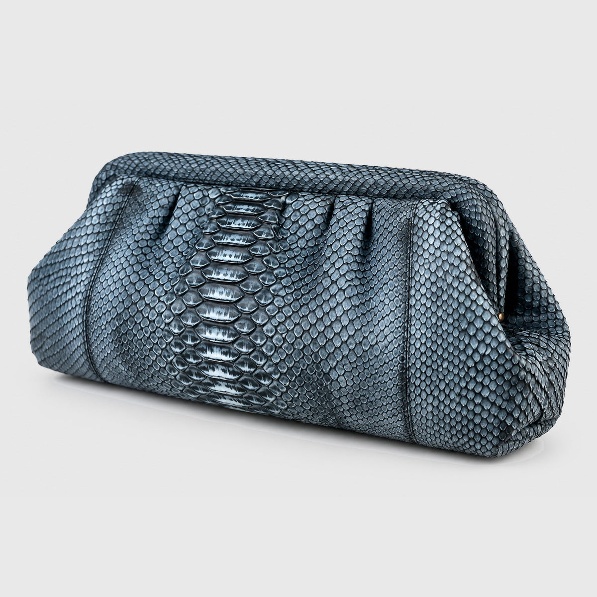 Genuine python leather clutch Slate Blue – three-quarter view, 2048 x 2048, light gray studio background