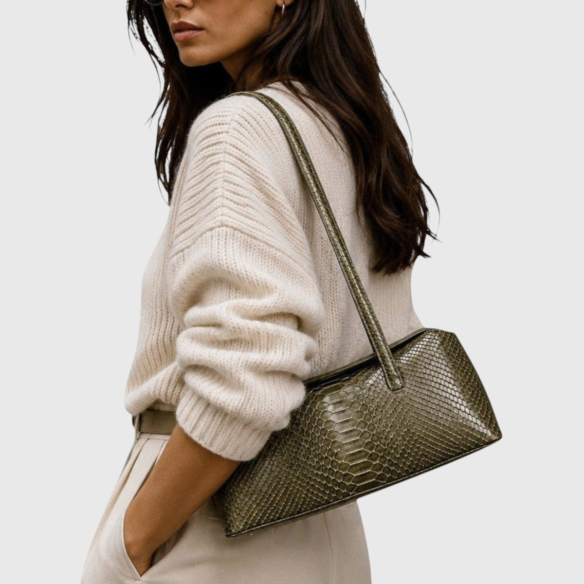 Green Python Signature Tote worn by a woman
